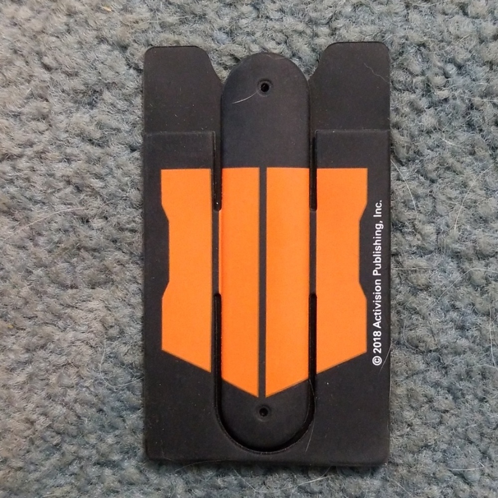 Quick-snap phone wallet and stand Call of Duty